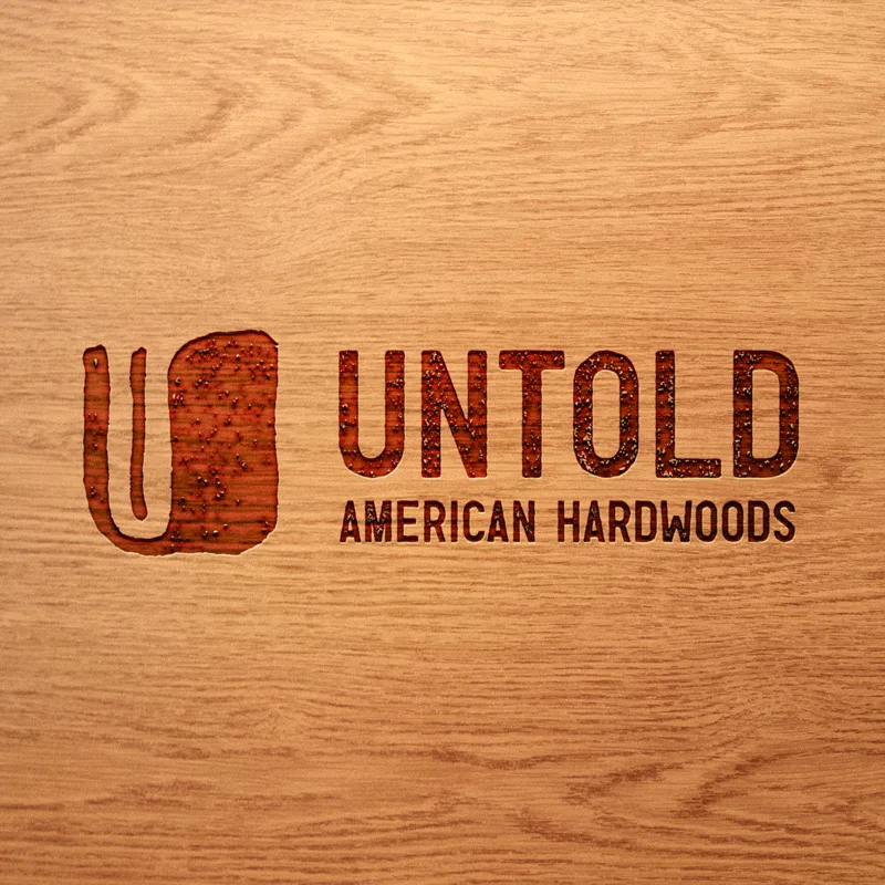 untold american hardwoods wood burned logo